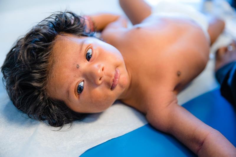 a baby with a full head of hair